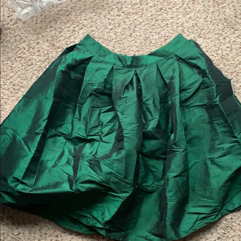 Green a line midi skirt. Zip back